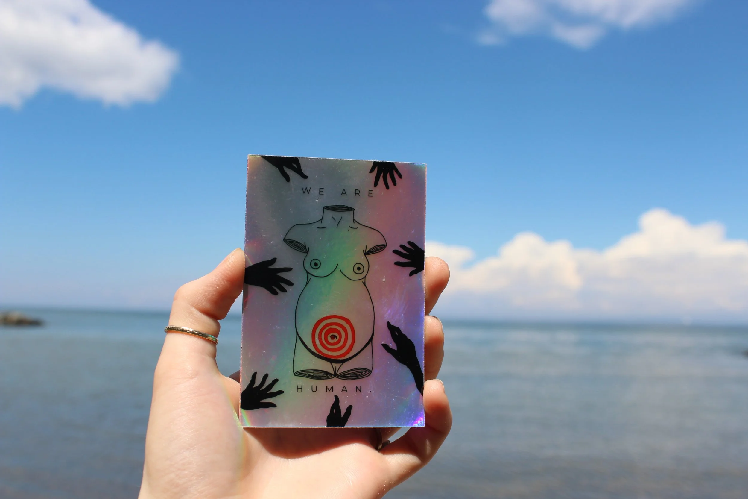 We Are Human Holographic Sticker