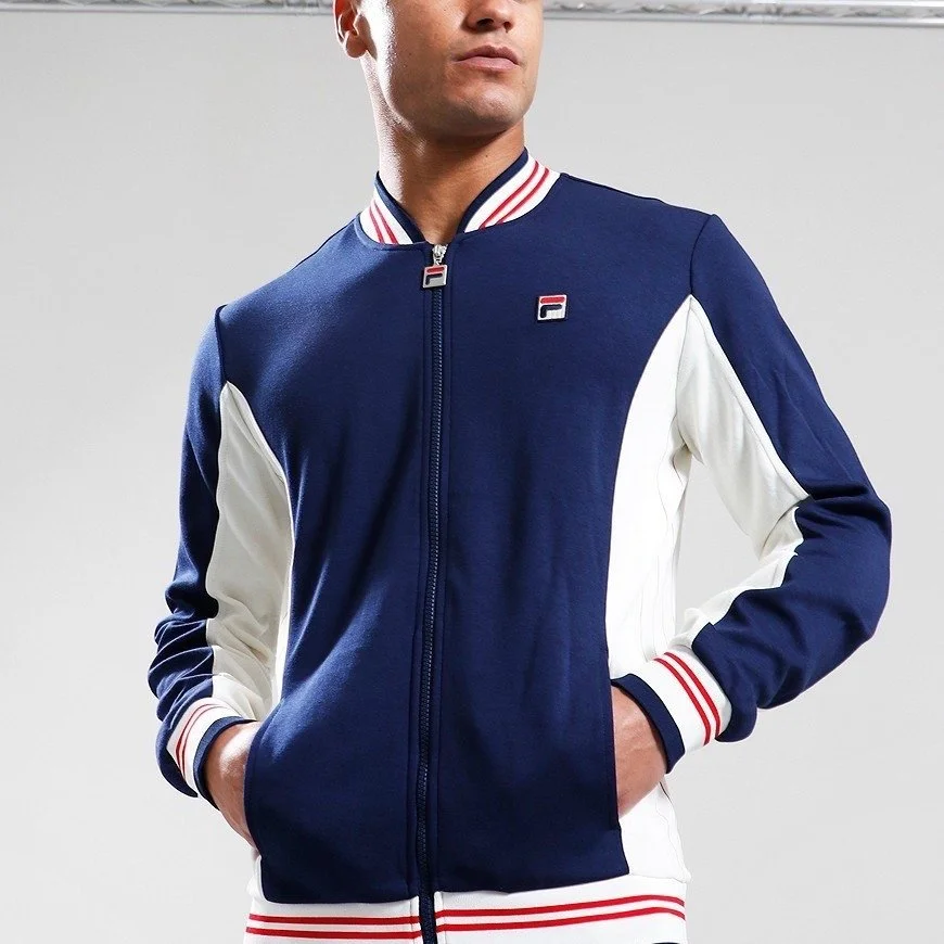 We are delighted to share with you the second iconic brand that Slow Time Mondays will be stocking. Founded in 1911 by 4 brothers in Coggiola, Italy, Fila has become one of the most instantly recognisable leisure brands in the world, worn by icons su
