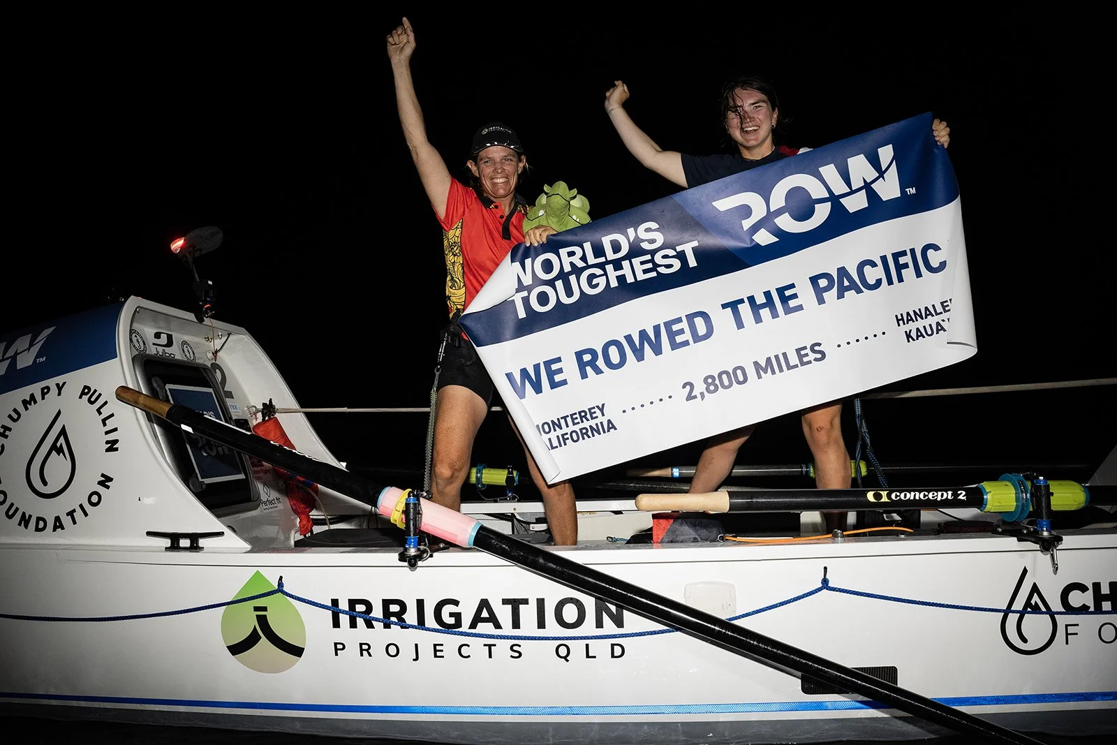 Liz Wardley and Lena Kerbial celebrating after completing the World’s Toughest Row Pacific from Monterey to Hawaii.