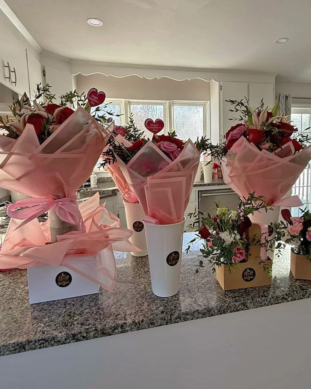 Elegant pink floral arrangements by The Secret Garden for a special event in Hudson, Massachusetts.