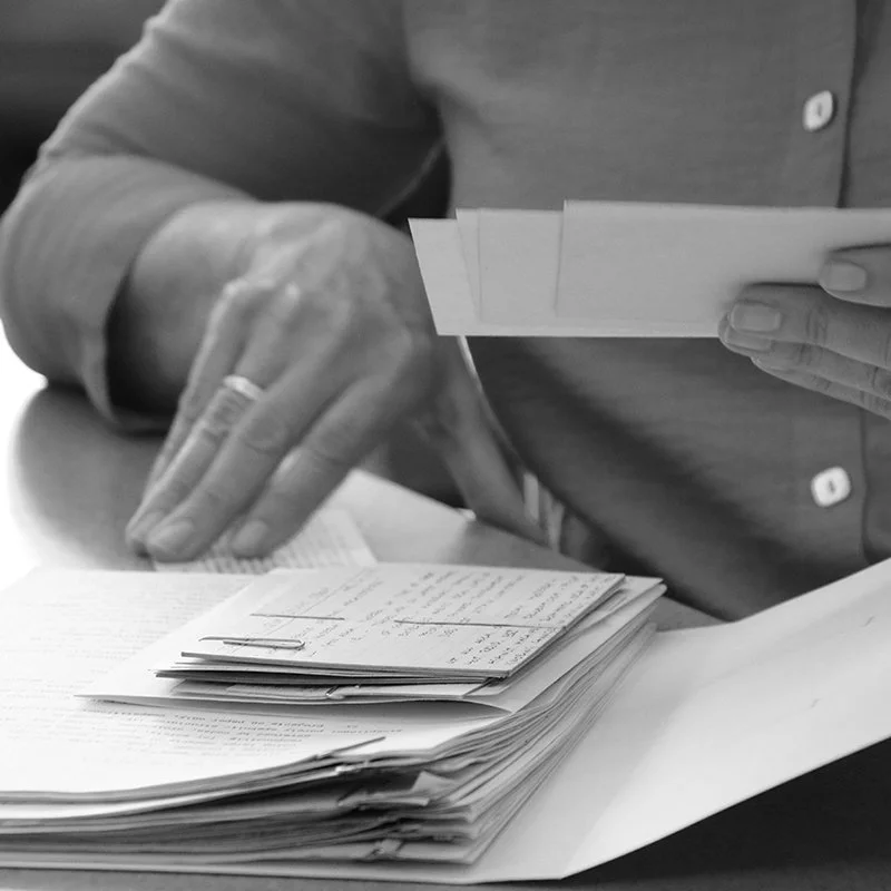 Hands holding notes