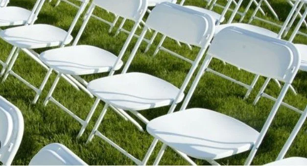White collapsible plastic chairs