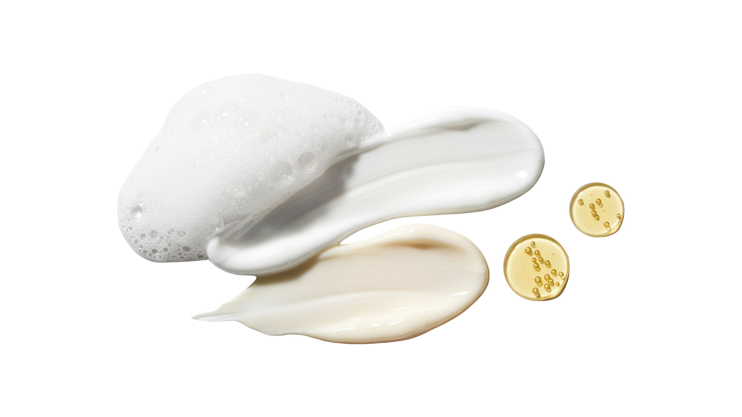 A photograph of white lotion or cream and two yellow effervescent tablets on a black background.