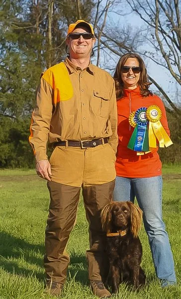 Pocotaligo's Cooper JH Titel with owners Lee and Carol Anne Dutton. He was a good boy and went 4-4..jpg