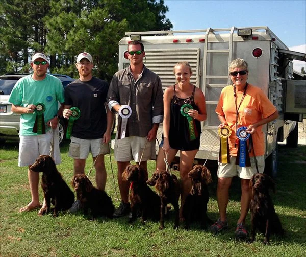 CBSRC Trial 6-27-15- Senior Puppy Ribbons- L to R- Mack Kennedy and Jax-David Firestone & Brynn, Stephen Stafford and gauge Samantha Firestone and Reese- Kim Parkman with Jed and Trouble.jpg