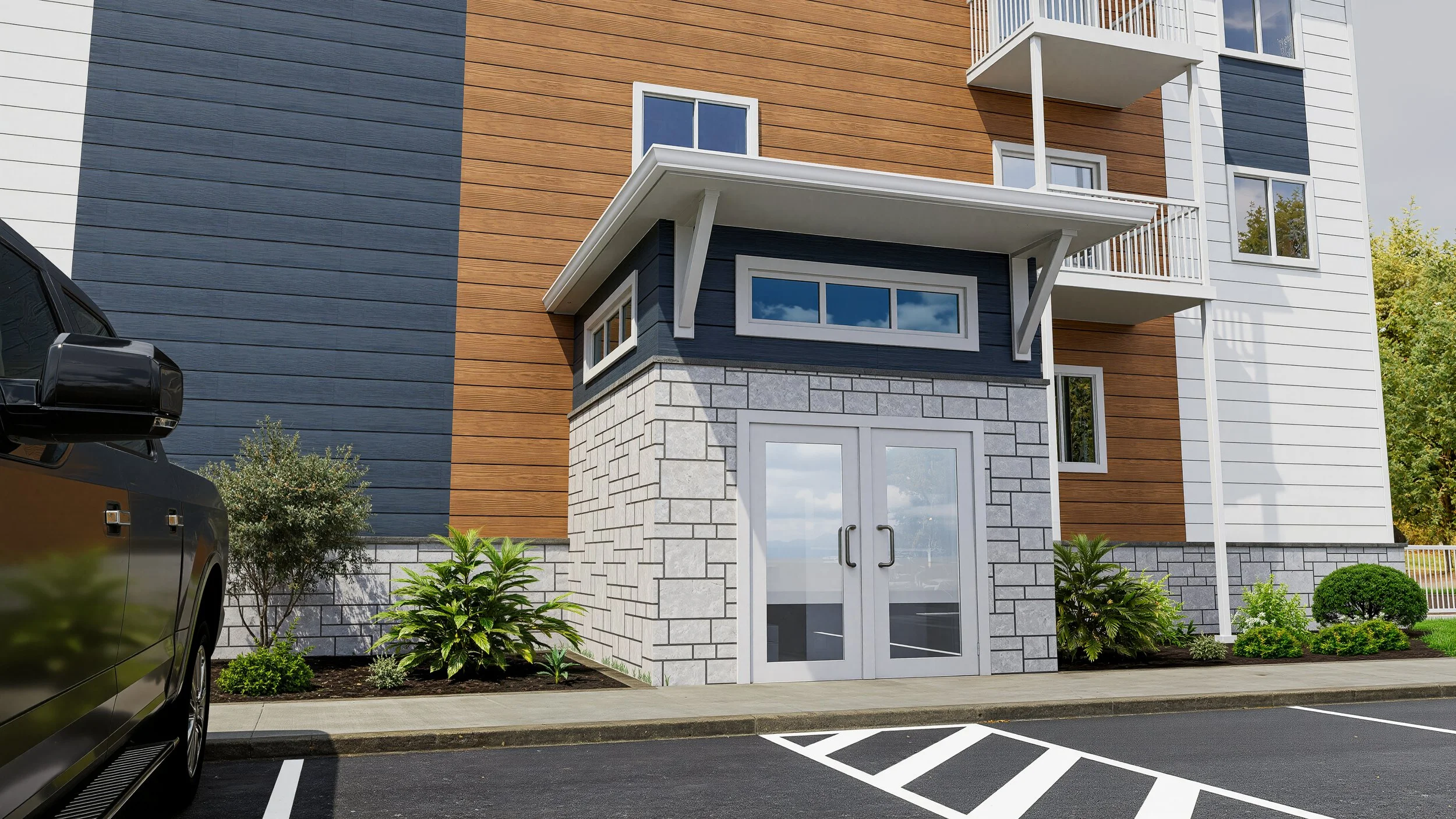 Exterior view of a modern multi-story building with a parking lot in front, featuring a black vehicle and greenery.