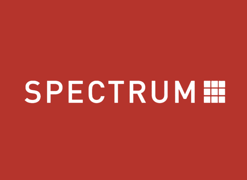 Red background with the word 'SPECTRUM' in white capital letters and a logo made of nine small squares arranged in a 3x3 grid.
