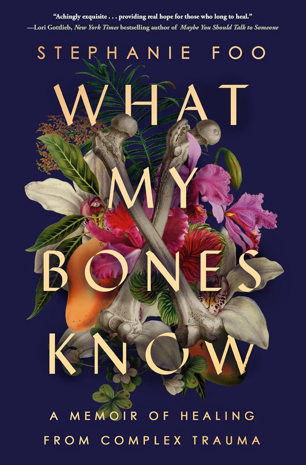 Book cover titled 'What My Bones Know: A Memoir of Healing From Complex Trauma' by Stephanie Foo, featuring a dark background with botanical illustrations, flowers, leaves, and crossed bones.