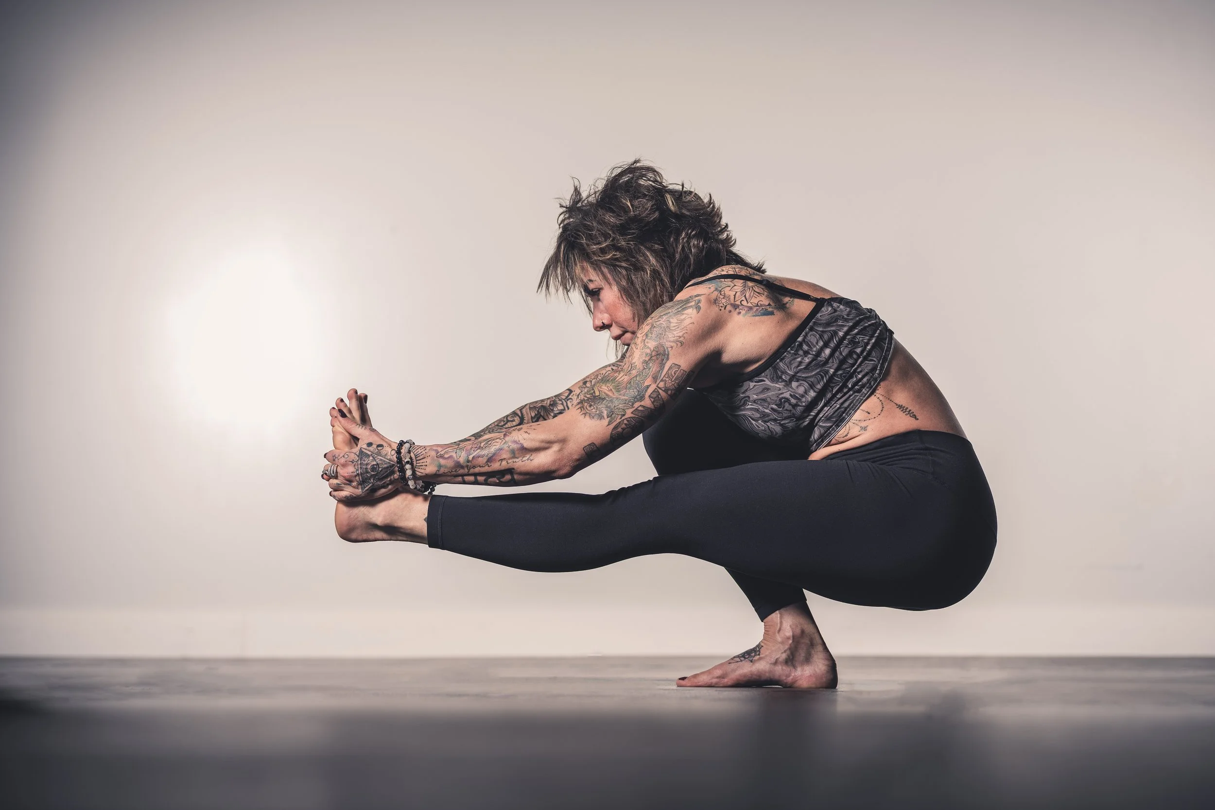 Colleen, founder of Trinity Embodied Empowerment, guiding a practice rooted in strength, balance, and mind-body connection.