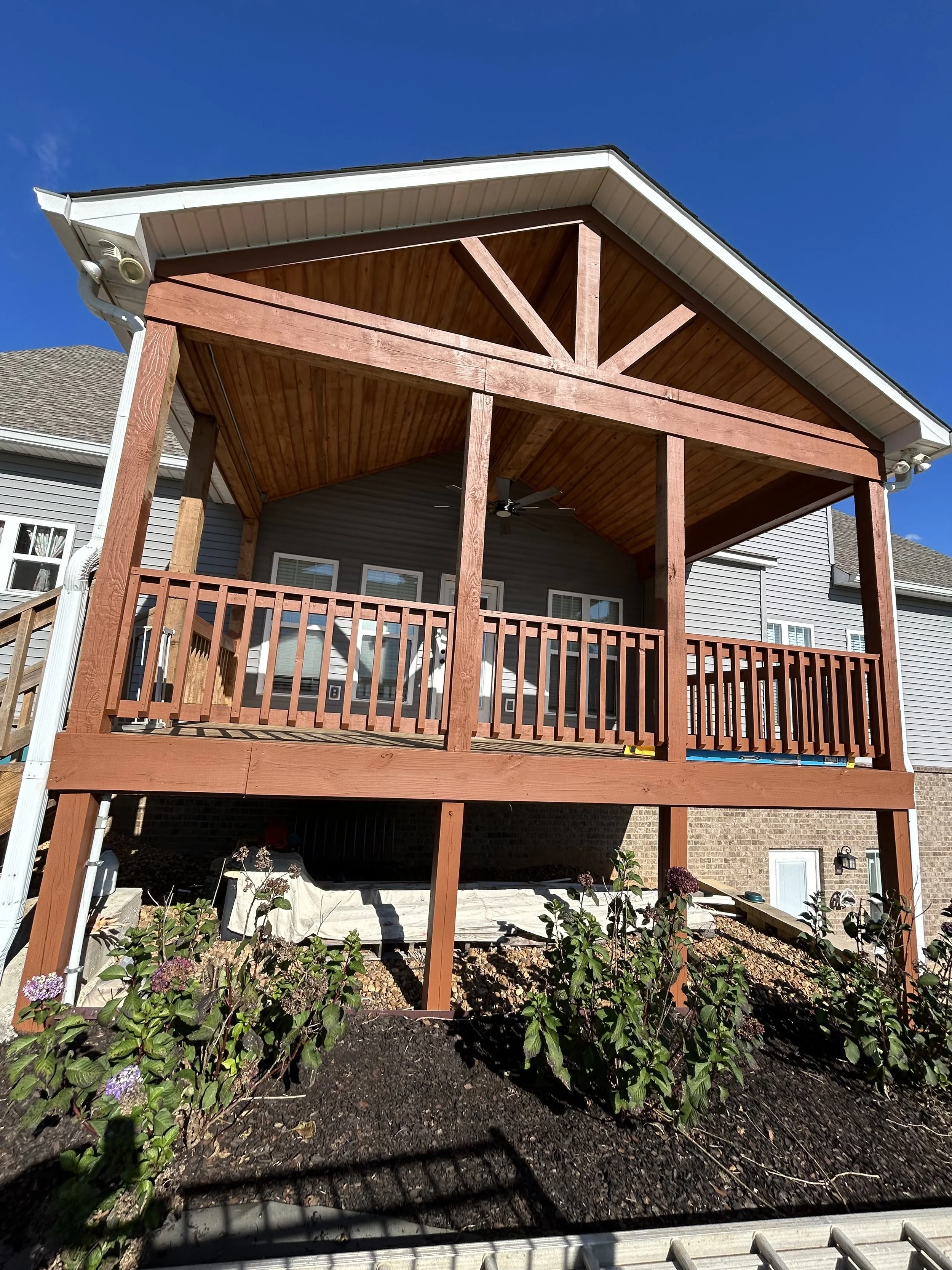 Restored deck by sanding, staining and polishing