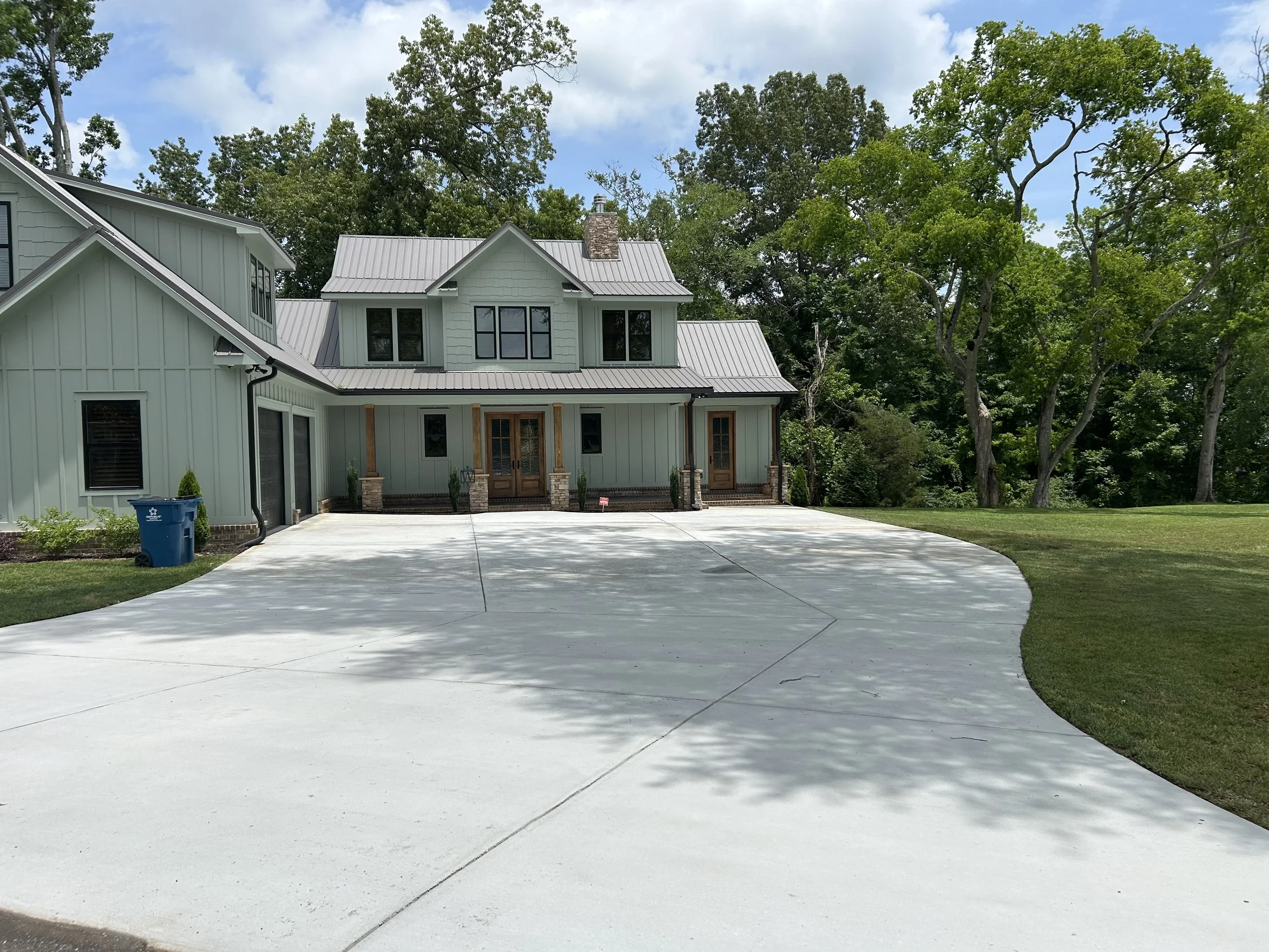 Restored driveway by using environmental safe chemicals and pressure washing