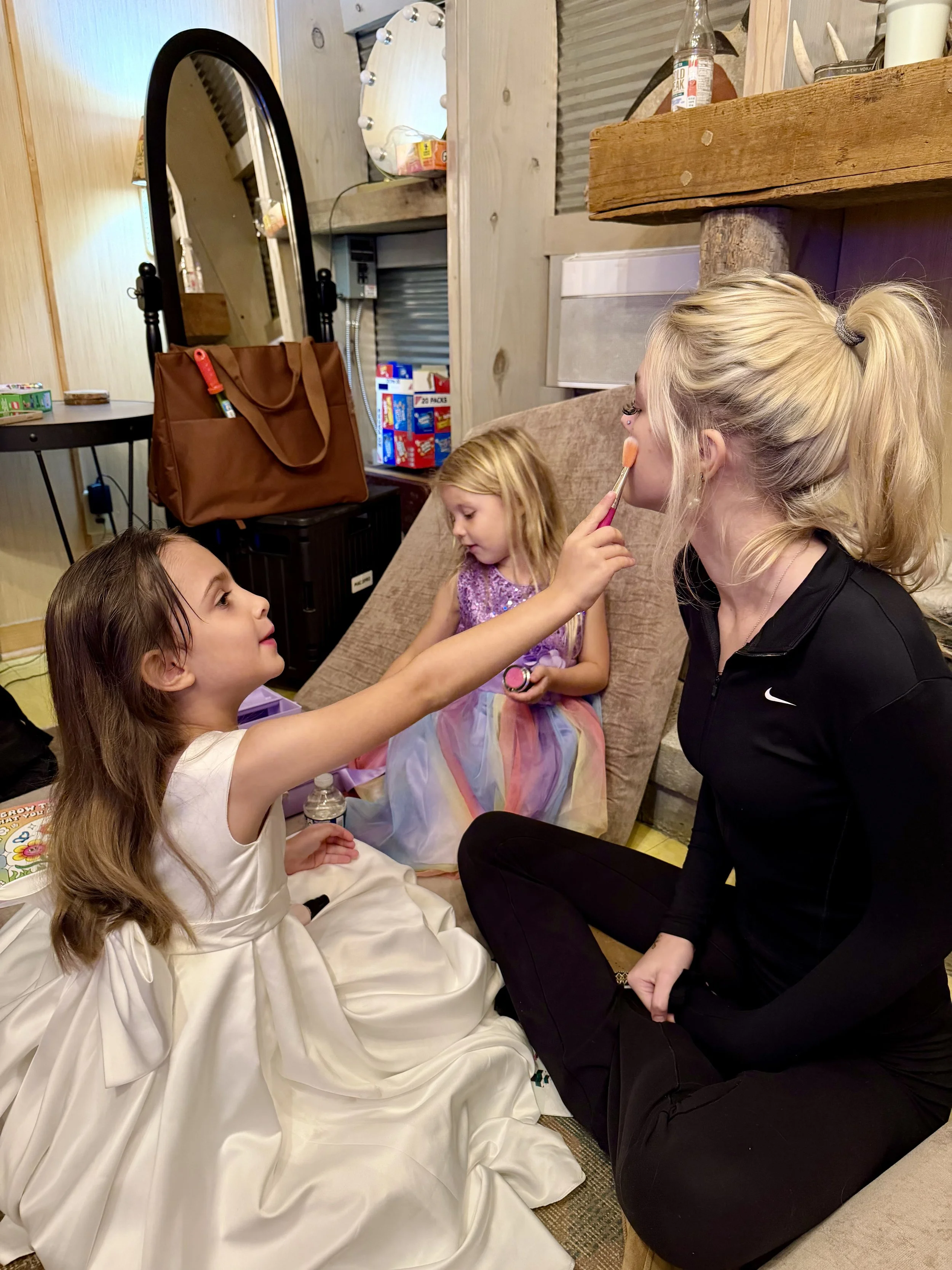 Knot Nannies caregiver providing childcare for children at a West Michigan wedding