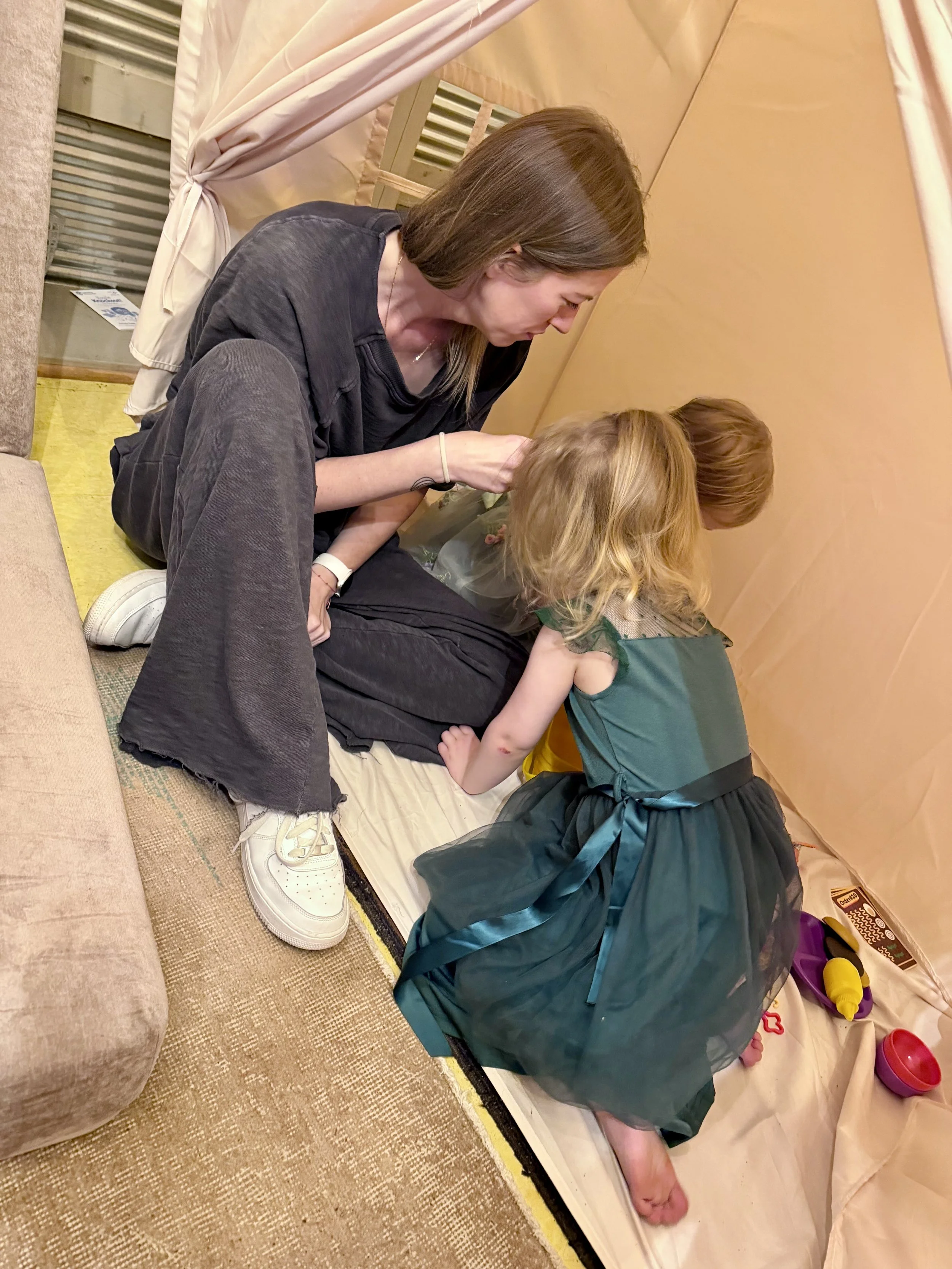 Knot Nannies lead caregiver providing childcare for children at a West Michigan wedding
