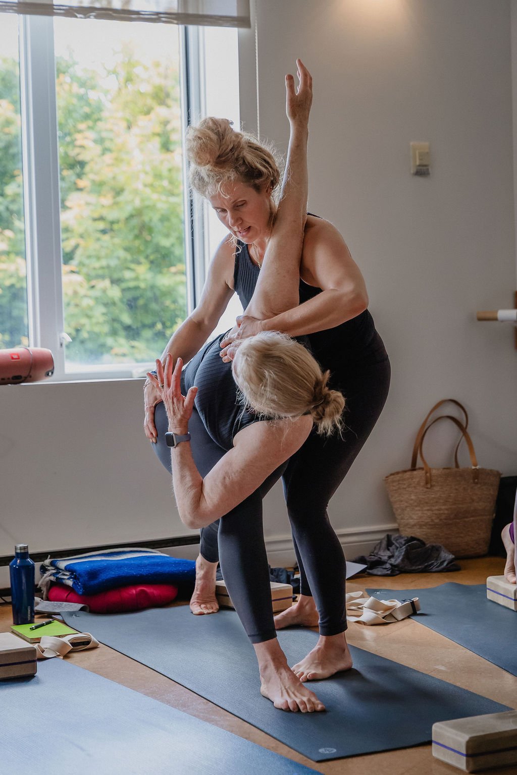 Teacher giving a student a hands-on assist in a Katonah class