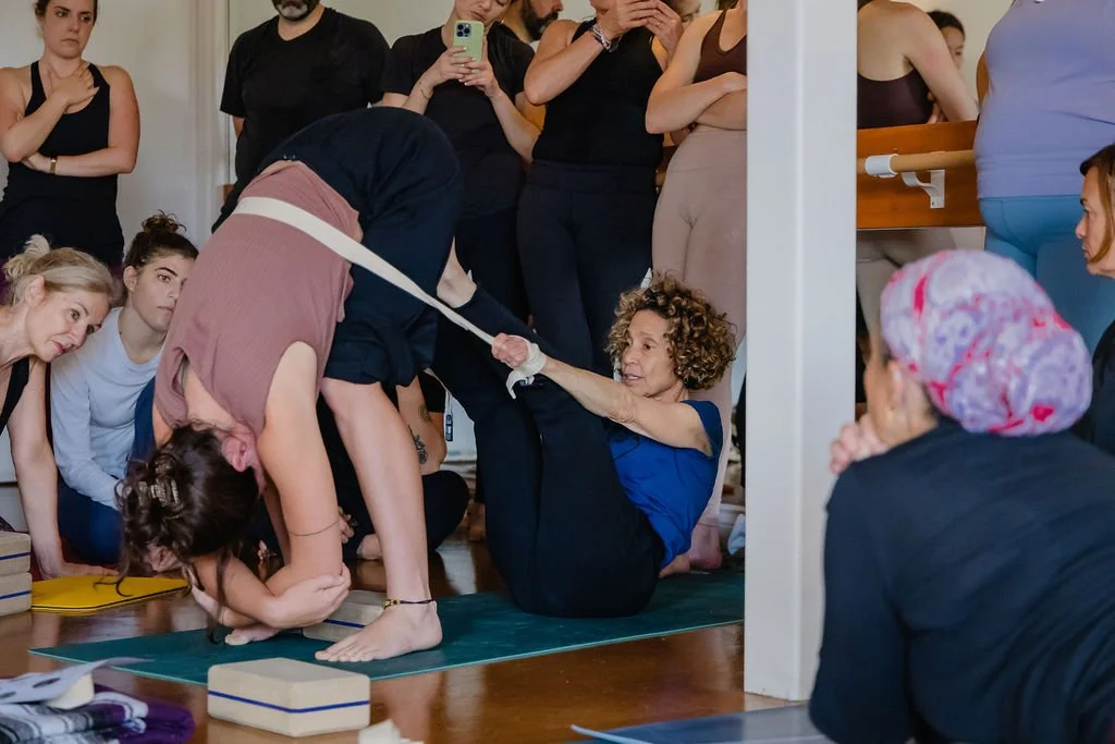 Abbie Galvin giving a student a hands-on assist in a Katonah workshop