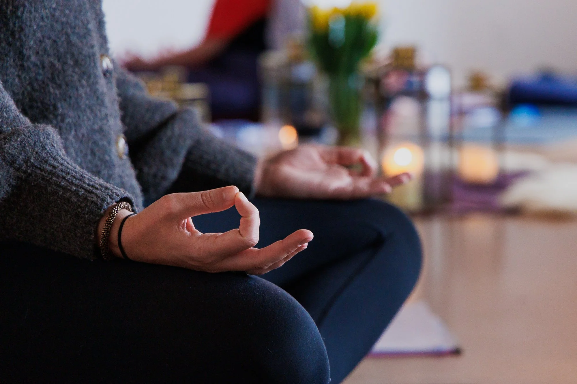 Person in meditation with hands in gyan mudra