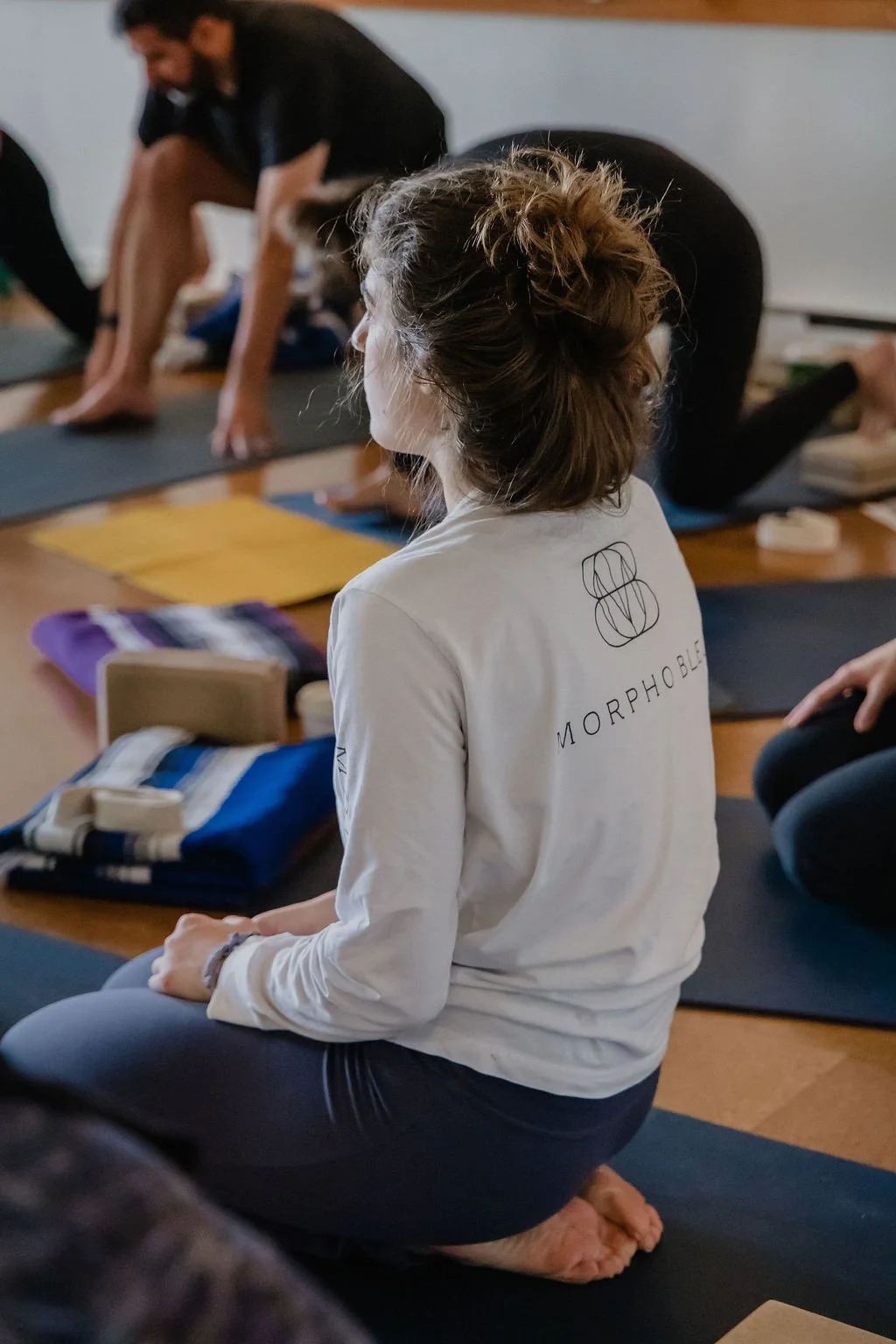 Student wearing a Morpho Bleu shirt in a Katonah training