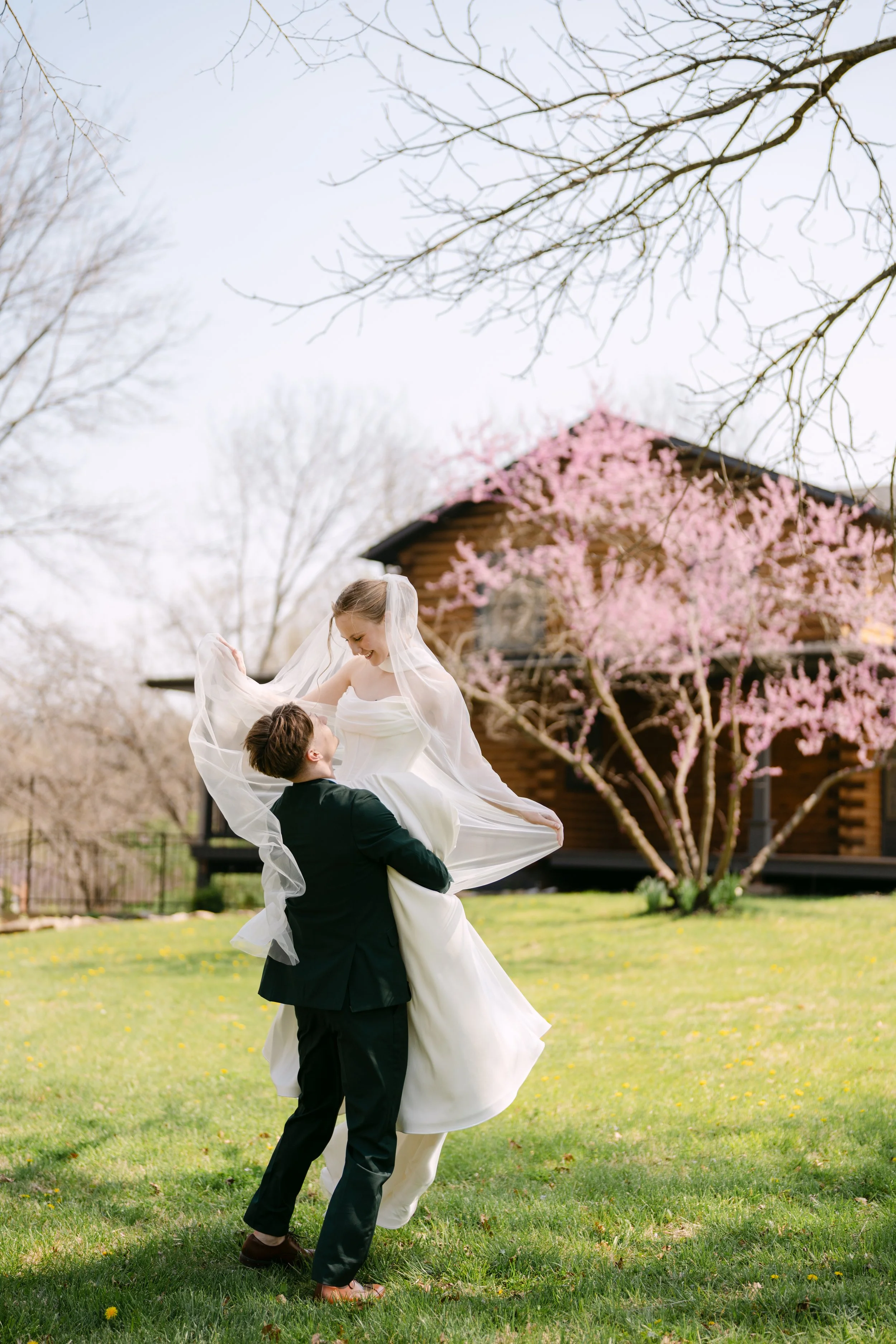 couples portrait photography, groom holding bride, wedding photograph