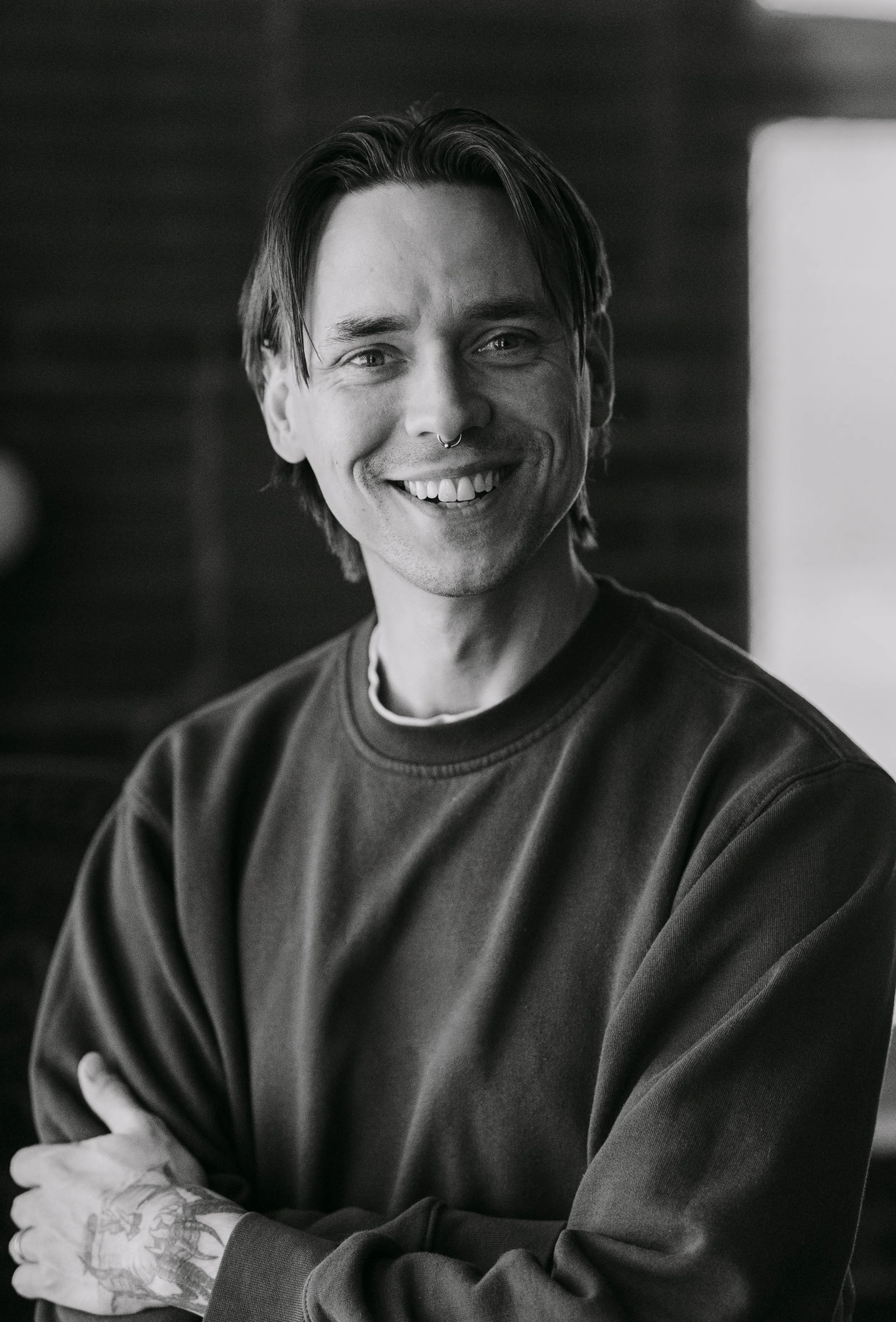 Portrait of Jordan Bright, wedding photographer and founder of maybright photo and film