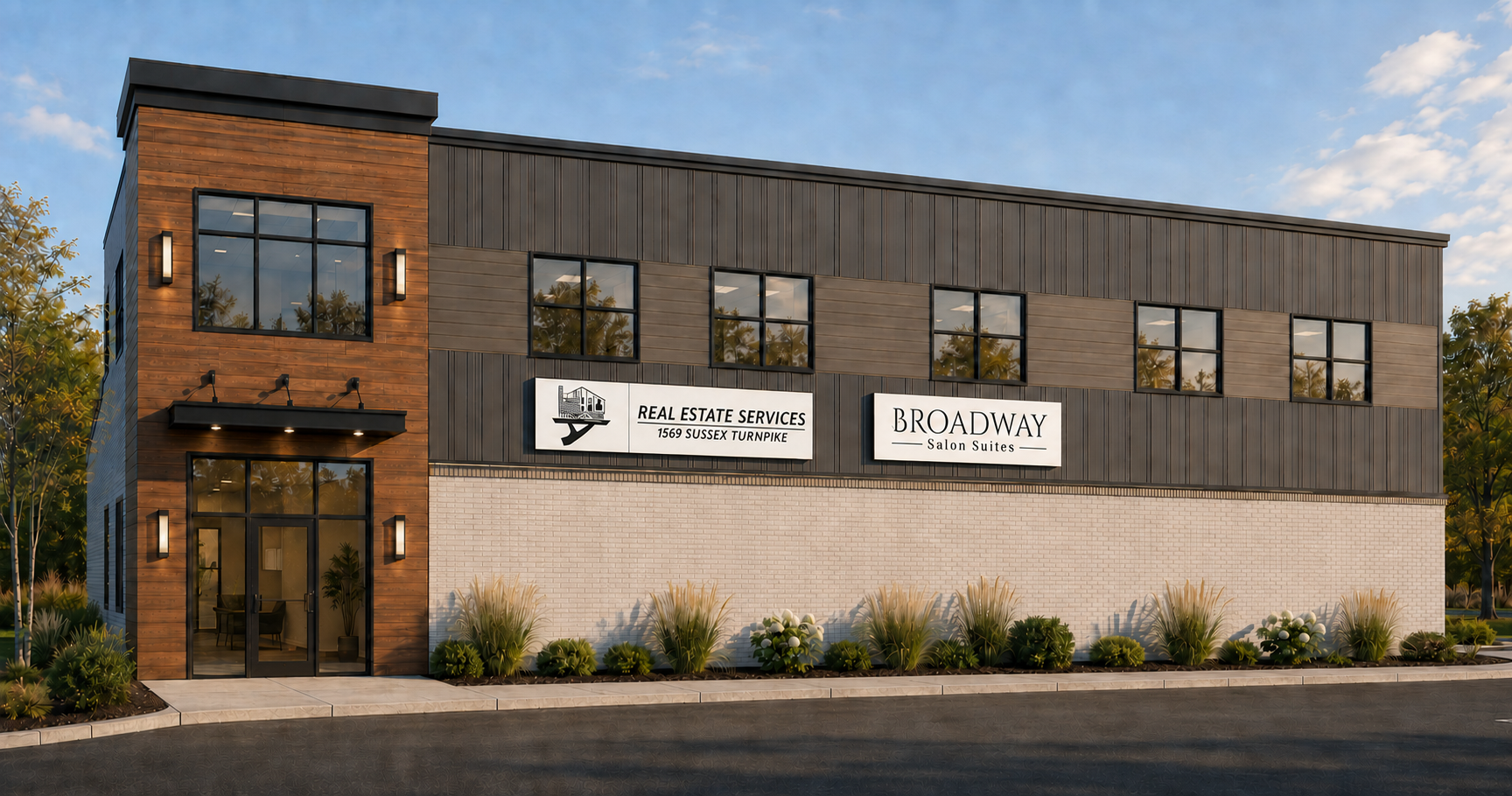 Modern building with signs for real estate services and salon suites, featuring brick, wood, and metal panel exterior, with landscaping and trees