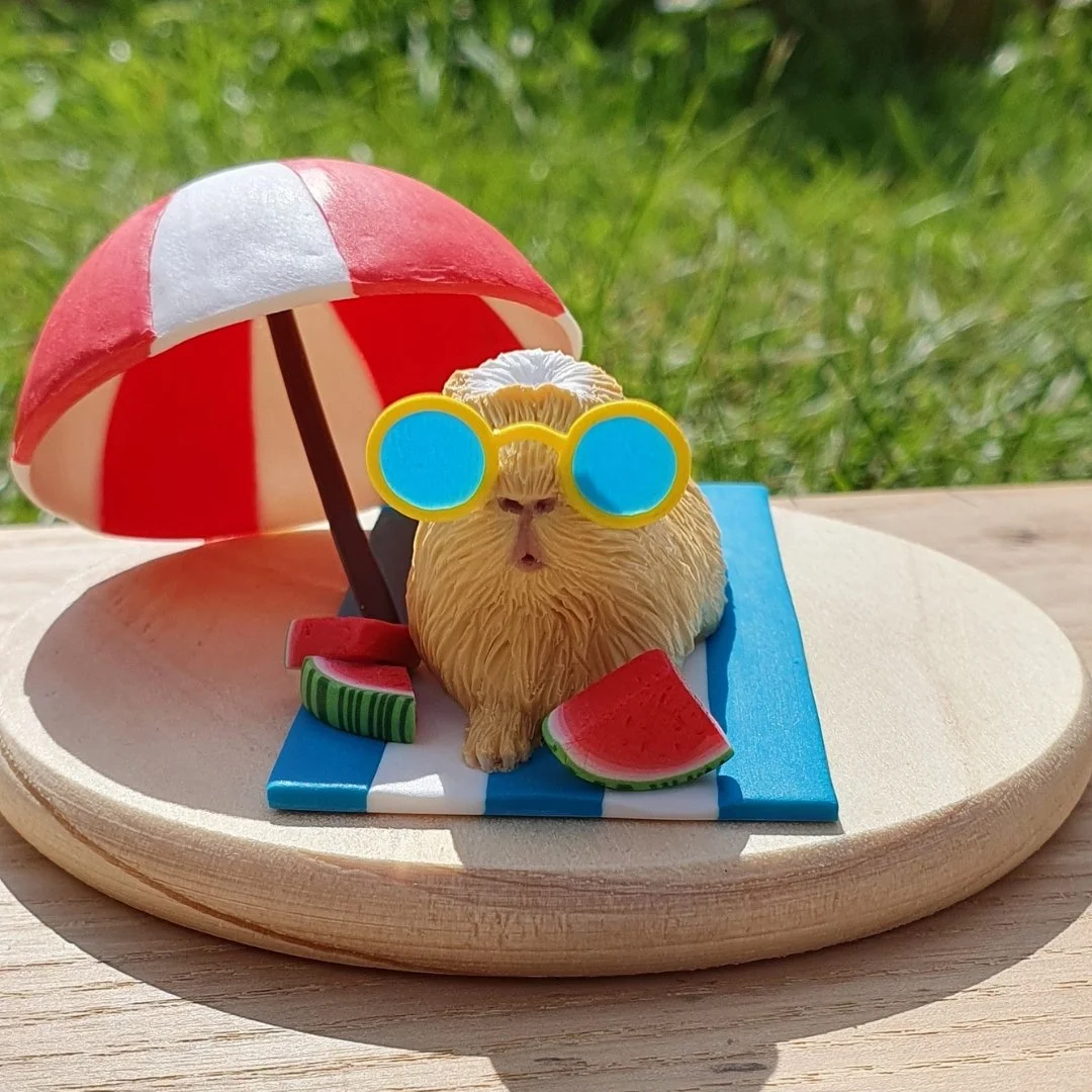 Summer Guinea Pig Sculpture