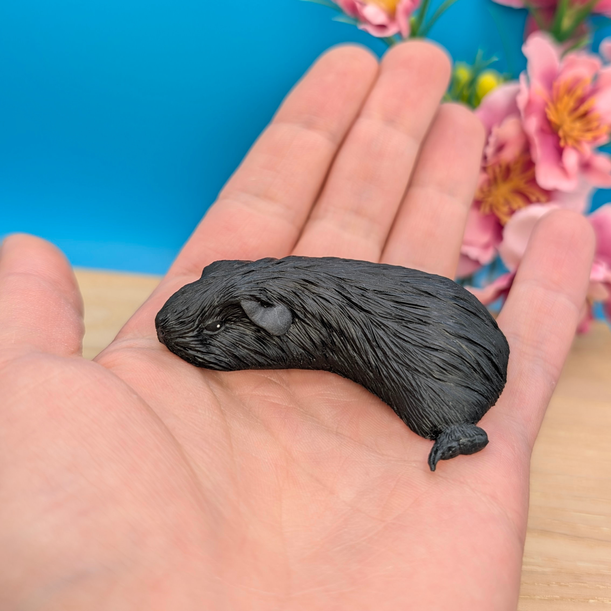 Black Sleeping Guinea Pig Sculpture