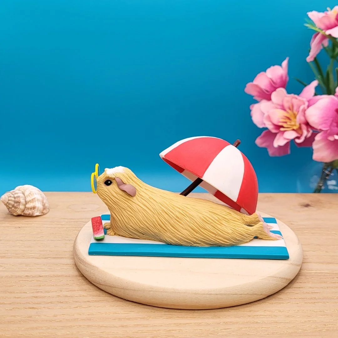 Summer Guinea Pig Sculpture