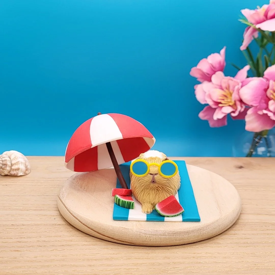 Summer Guinea Pig Sculpture