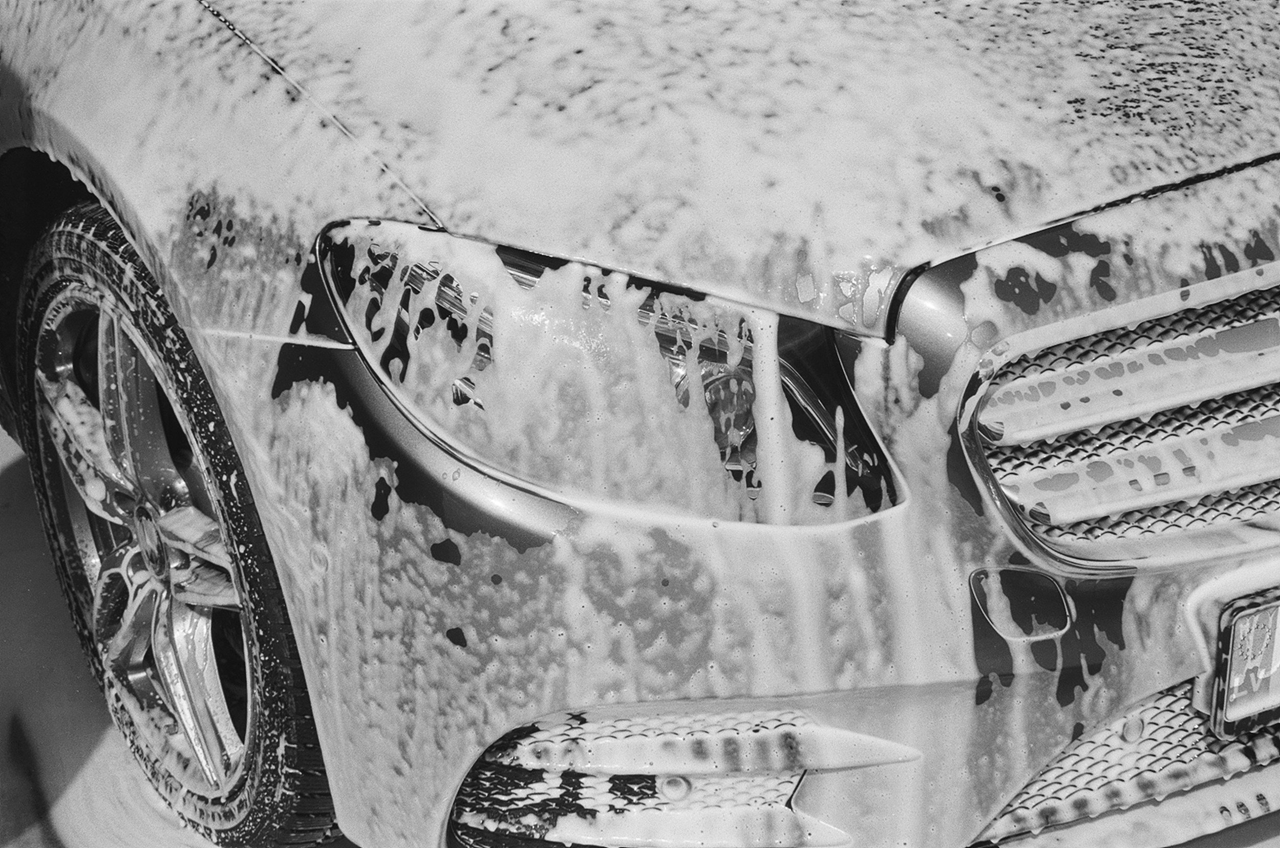 Car receiving a full-service wash at Casey’s Car Wash in Fort Collins