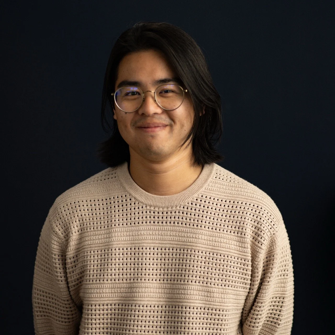 Smiling William Cho Frank Productions portrait team photo