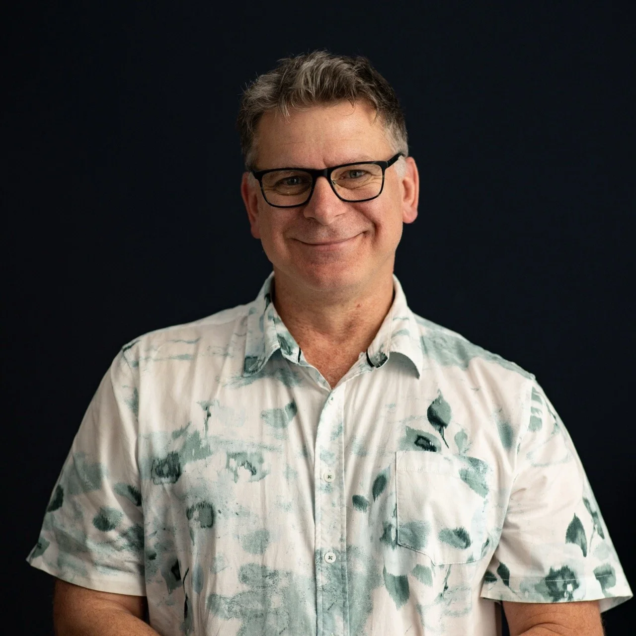 Smiling Chris Ward Frank Productions portrait team photo