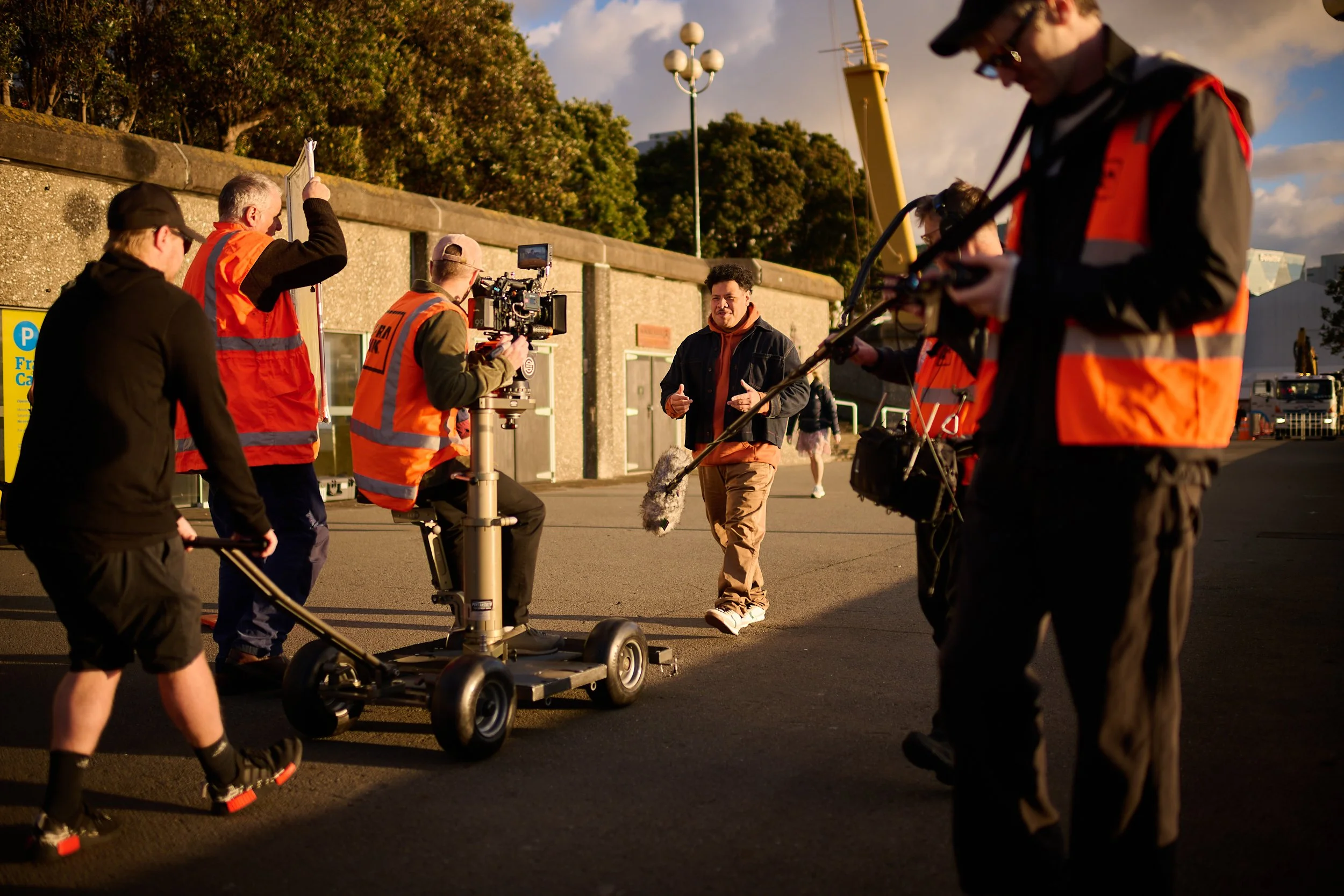 Camera operator Hamish McCormick with the Frank Productions team filming the Statistics New Zealand commercial 'Data Helps Us Do' on Wellington waterfront