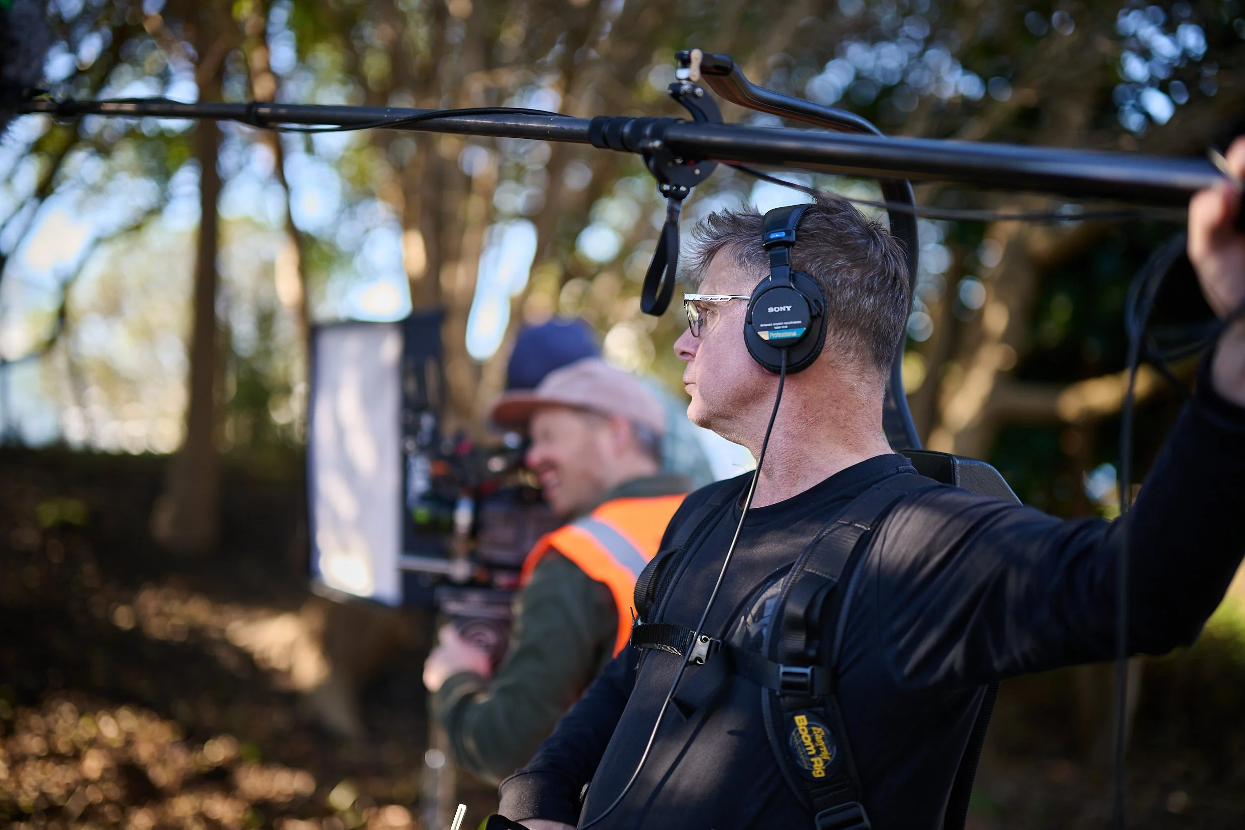 Sound recordist Chris Ward with the Frank Productions team recording the Statistics New Zealand commercial 'Data Helps Us Do' in nature