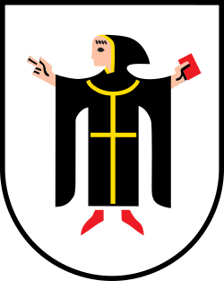 Grafische Darstellung einer Frau in schwarzem Kleid mit gelben Linien, fliegende Haare, hält ein rotes Buch in der Hand, vor einem weißen Schild