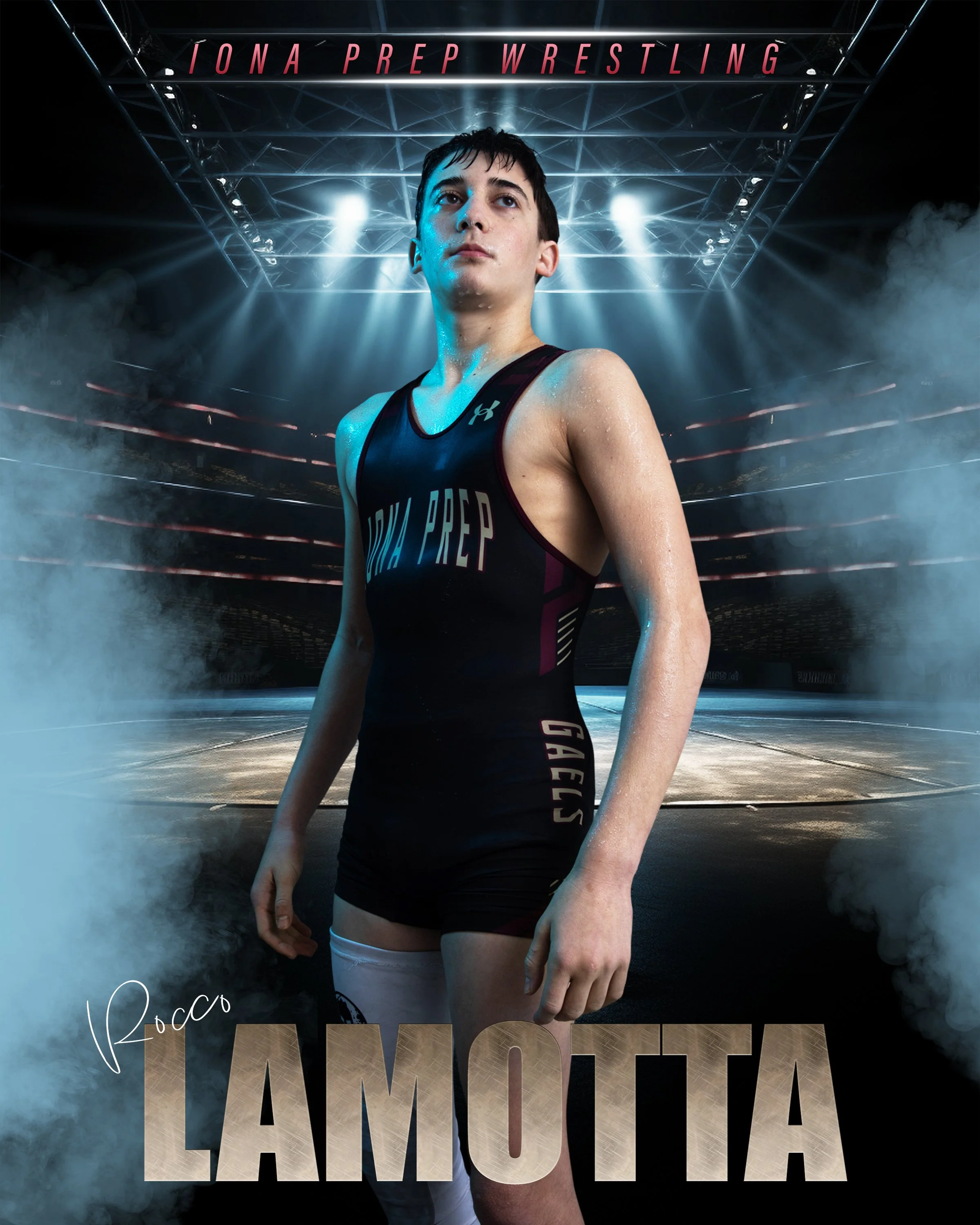A young female wrestler wearing a black wrestling singlet with 'IONA PREP' written on it, standing on a wrestling mat in a stadium with bright lights and smoke effects.