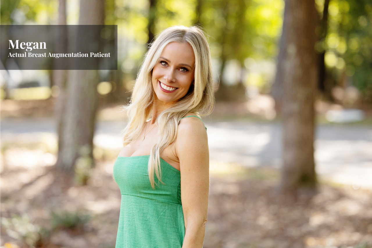 A smiling woman with long blonde hair wearing a green sleeveless dress outdoors in a wooded area, advertising breast augmentation patient Megan.