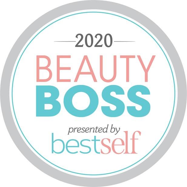 A circular badge with a gray border and white background featuring the text "2020 Beauty Boss presented by best self" in pink and blue fonts.