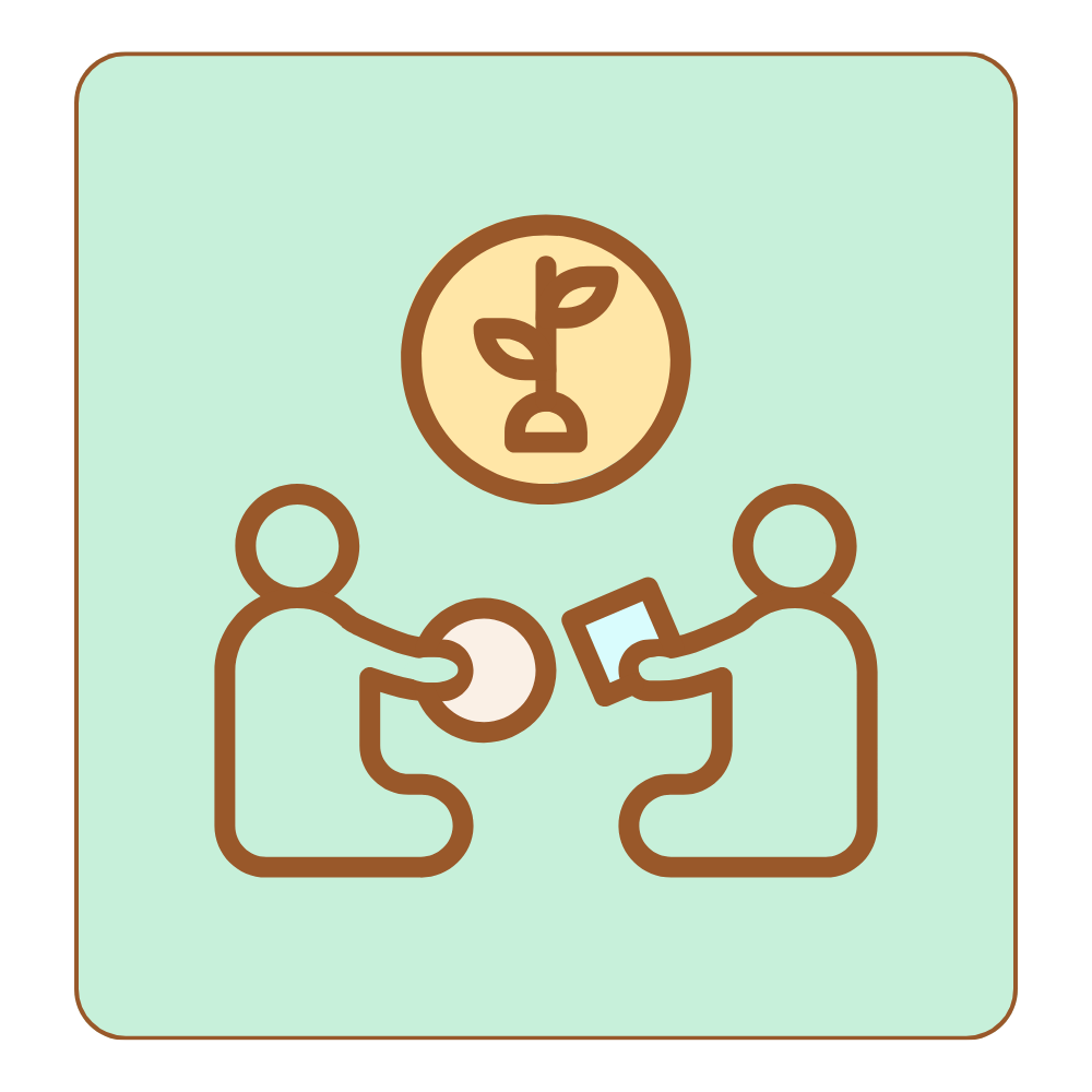 Two people sitting at a table with a plant icon in a circle above them, indicating sustainability or eco-friendly discussion.