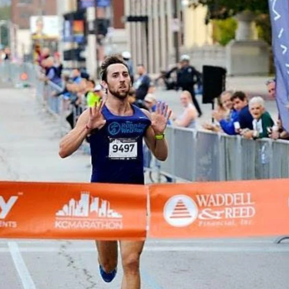 runfitcoach runner winning a race