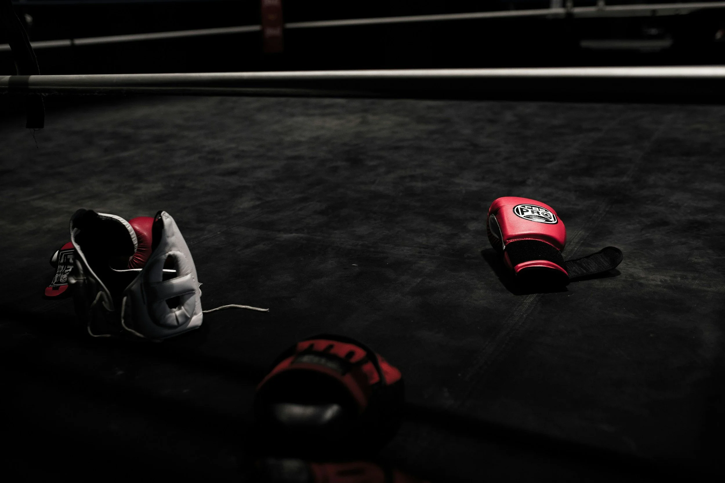 Boxing Ring with headgear, boxing gloves, and mitt