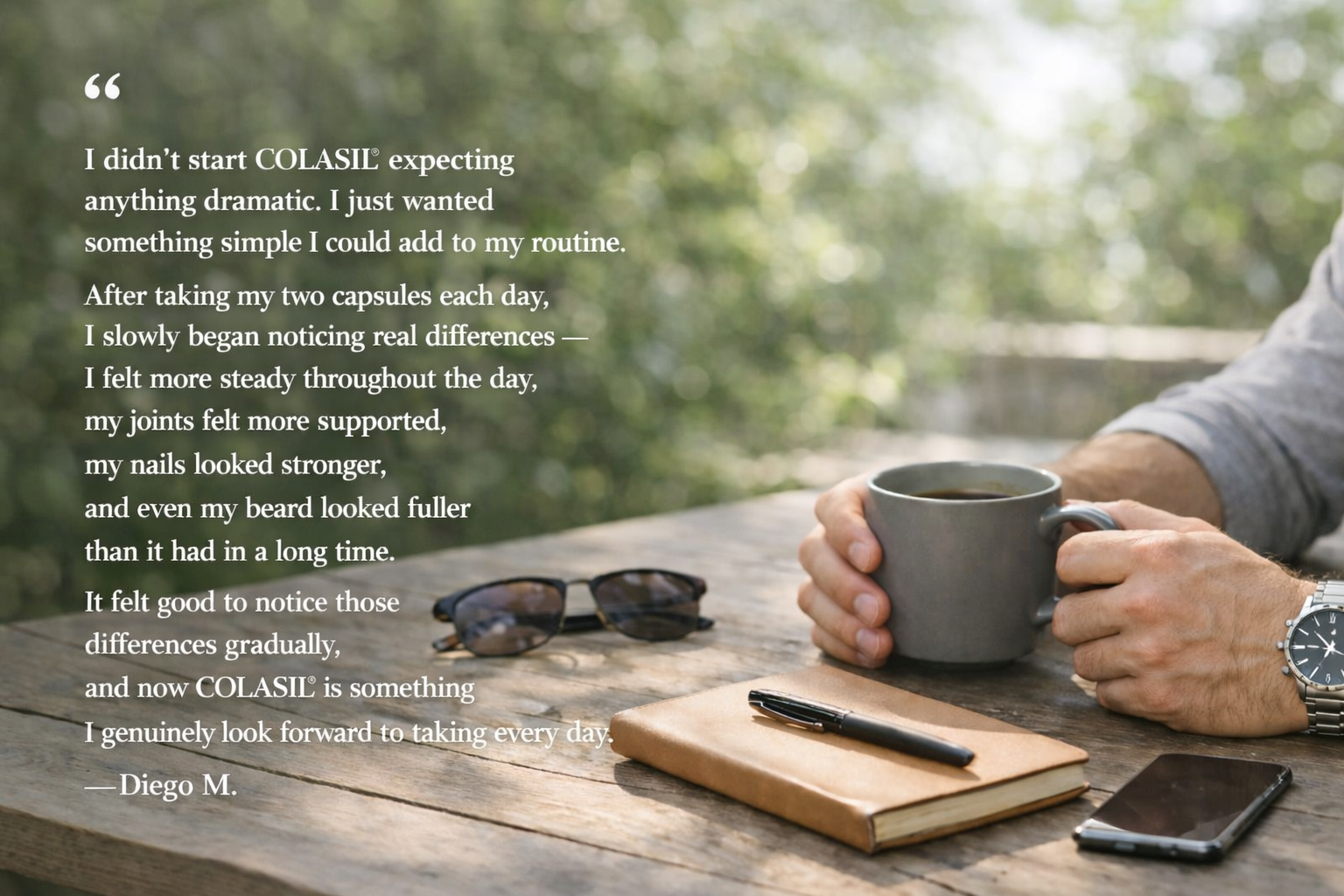 man holding mug on wooden table
