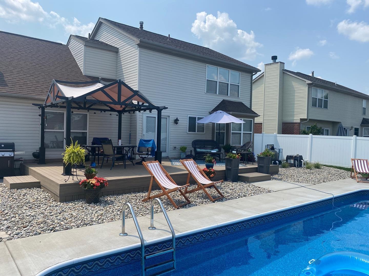 Bring the Home-Like Feel Outside By Including a Shaded Paver Patio in Your Trenton, MI Landscape Design 