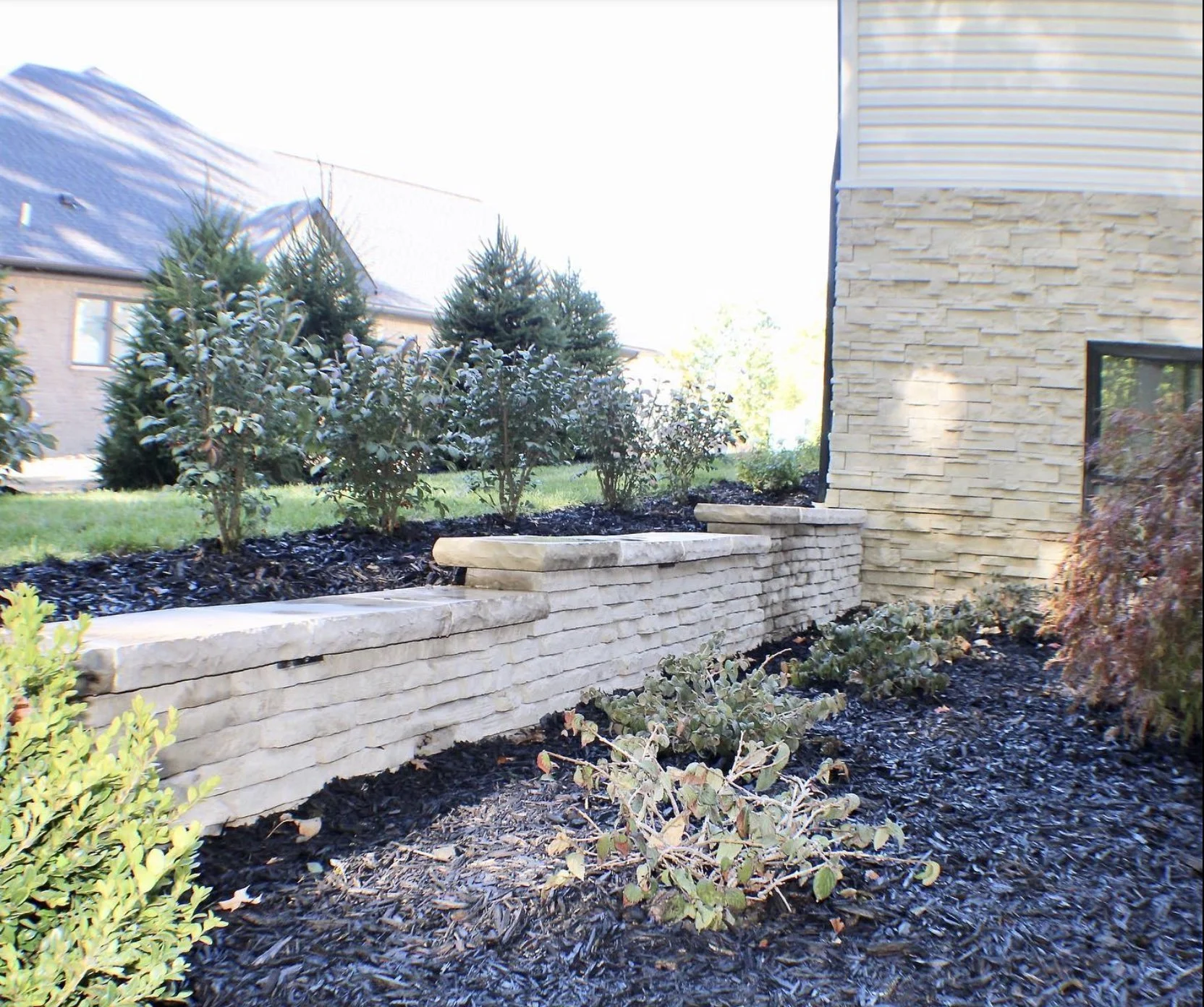 7 Ways a Strategically Placed Retaining Wall Can Transform Your Landscape Design in Flat Rock and Trenton, MI 