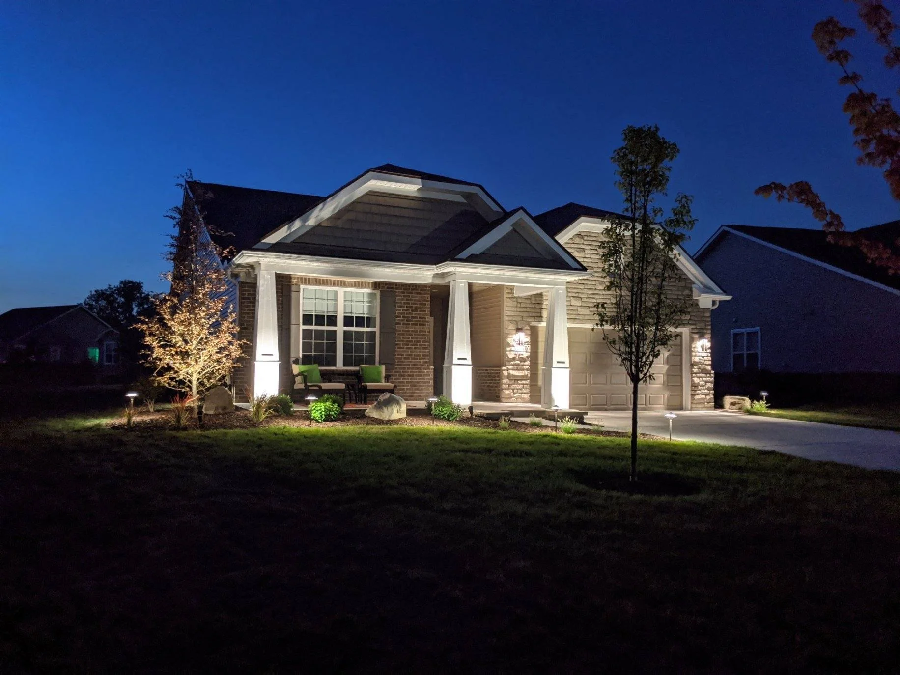 Low voltage LED lighting around paver patio — GLC Lawn & Landscape