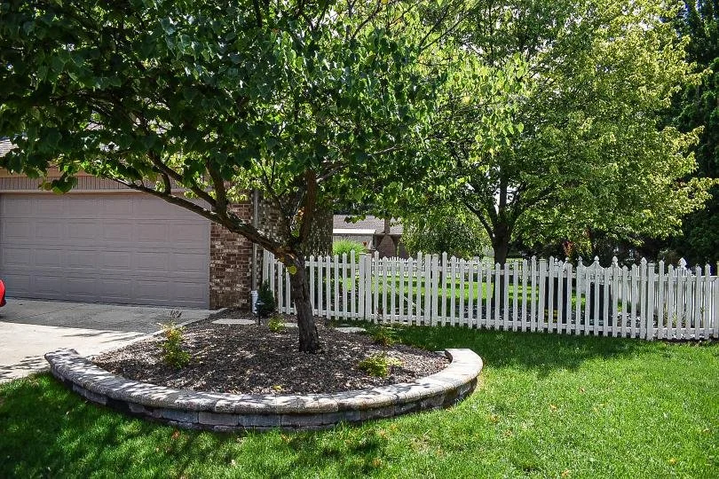 Mature tree integration and preservation incorporated into a thoughtfully designed front yard landscape renovation — GLC Lawn & Landscape