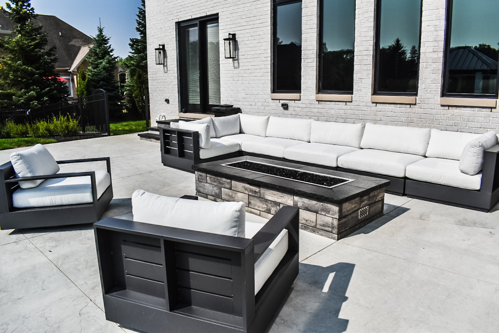 Gas fire pit with patio seating wall in Grosse Ile MI