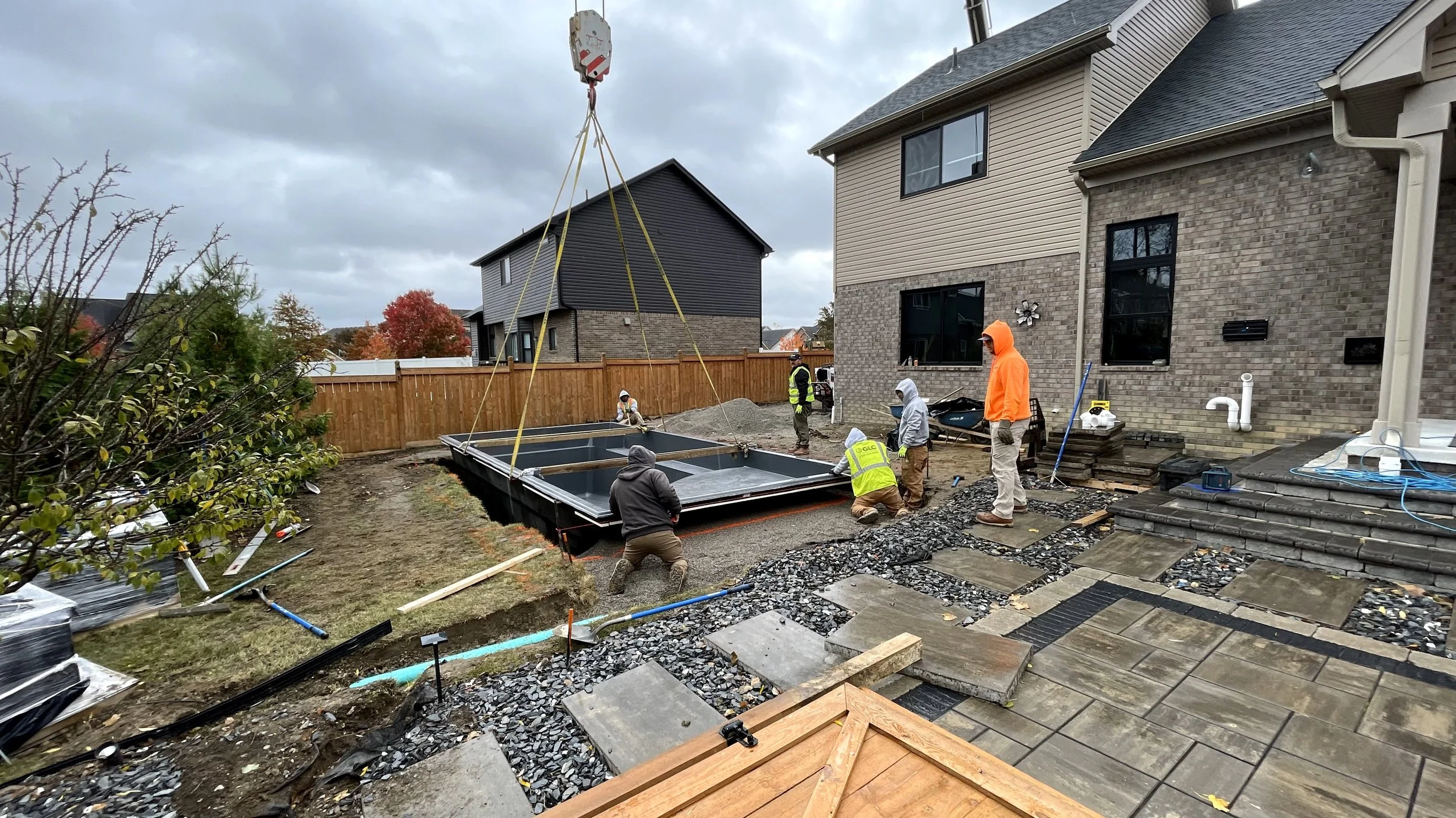 Paver patio and paver walkway installation creating outdoor living space in Trenton, MI