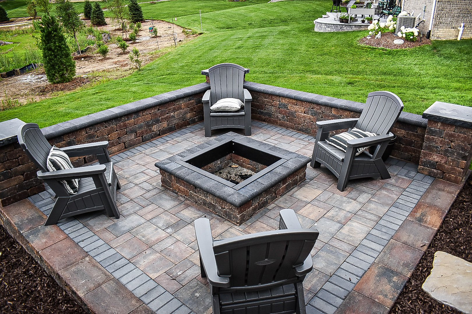 Backyard paver patio and gas fire pit installation — GLC Lawn & Landscape