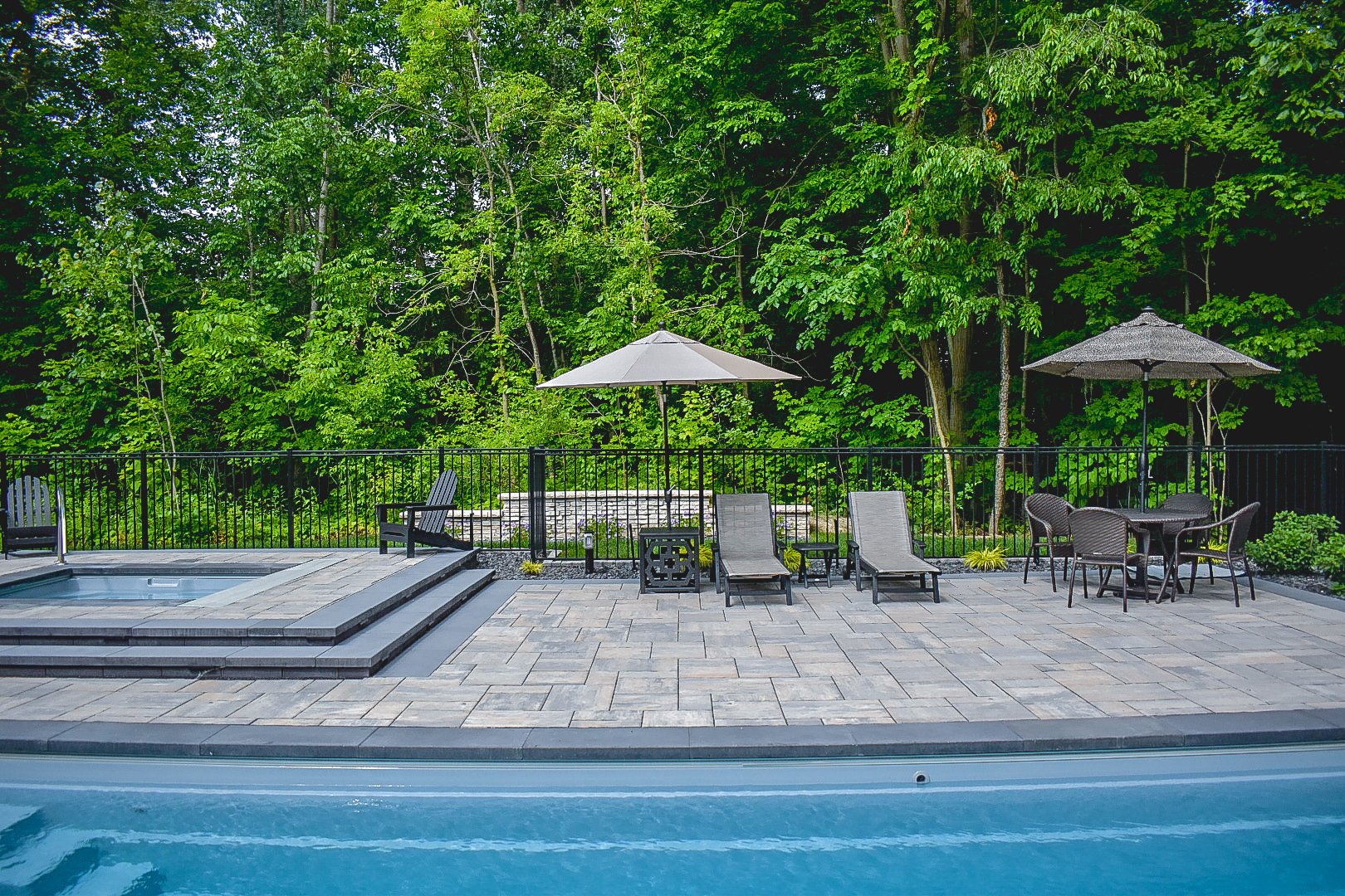 Design-build landscape project with finished hardscape in Monroe MI