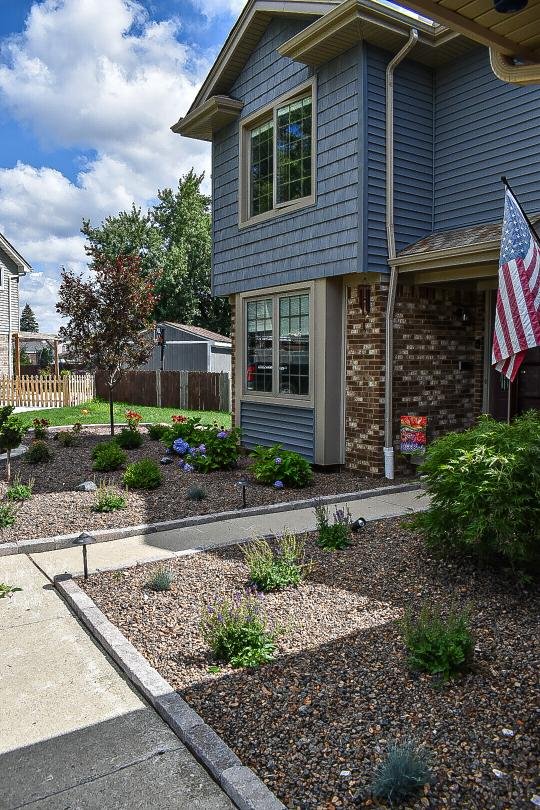 Ornamental shrubs and perennial plantings enhancing curb appeal with seasonal color and texture — GLC Lawn & Landscape